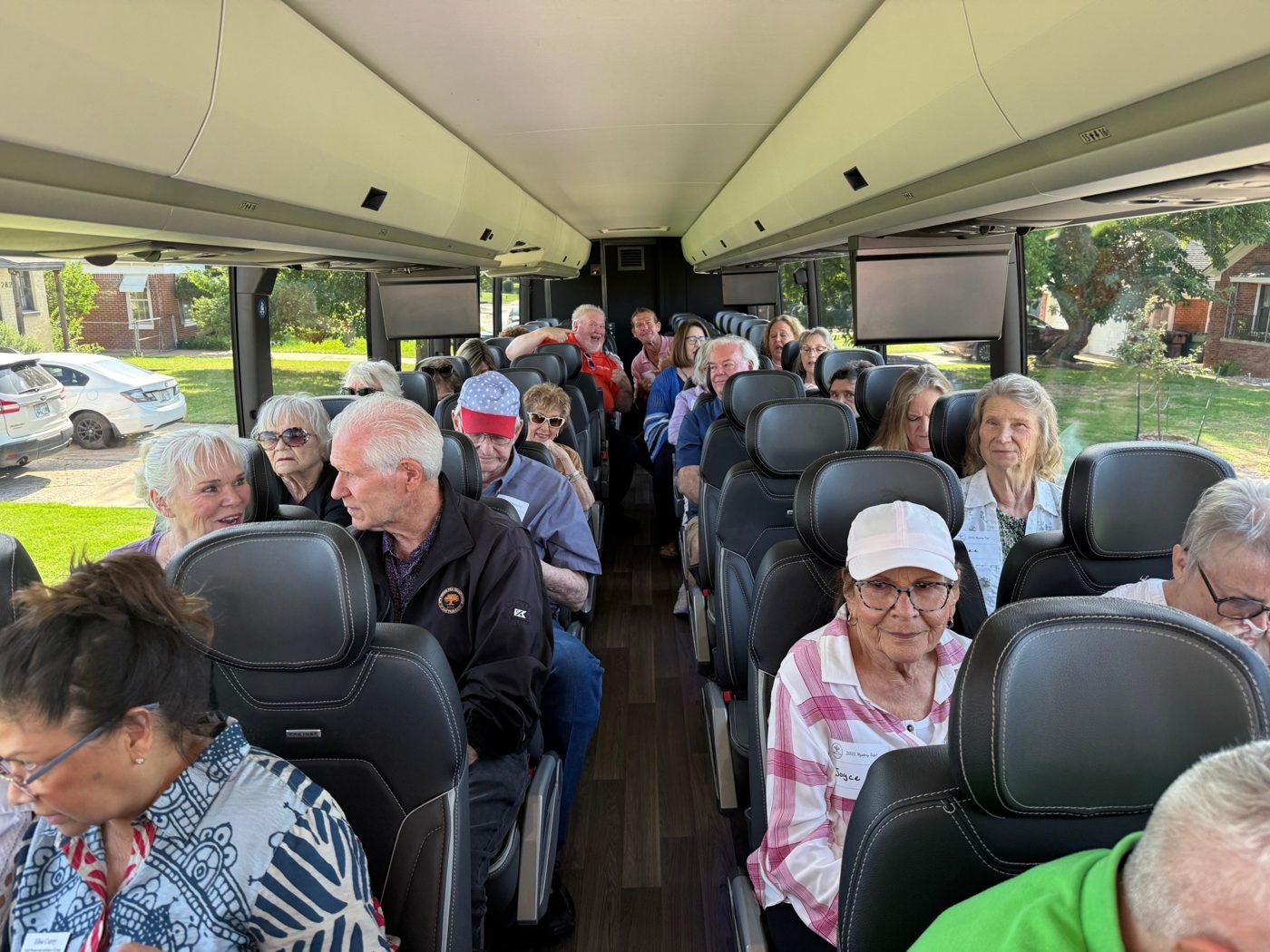 Friends and clients of Well Preserved aboard the bus for the 2025 Mystery Trip